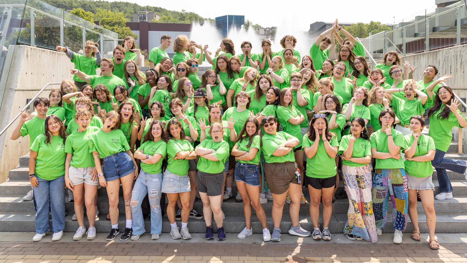 Fall 2024 Orientation staff posing on the IC Fountains steps for a personality picture