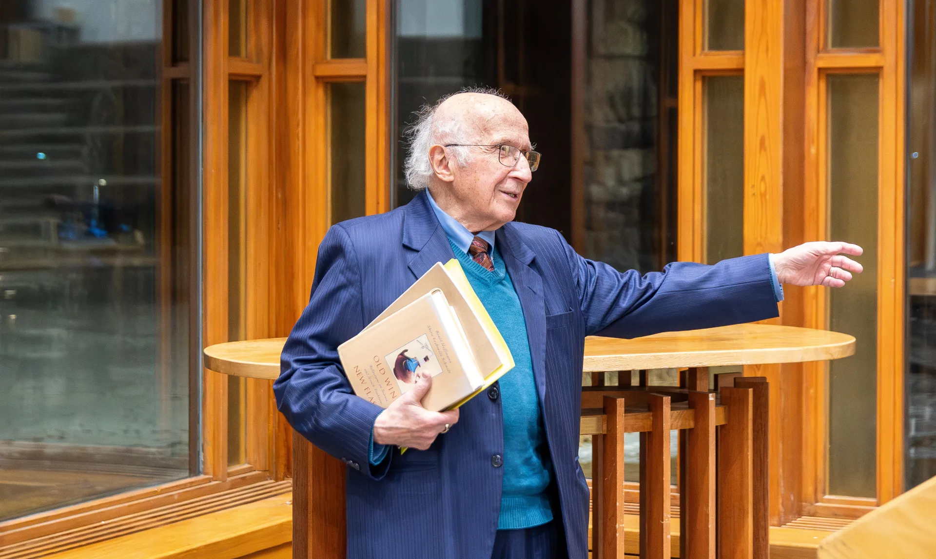 Roald Hoffmann gestures with his hand while speaking.