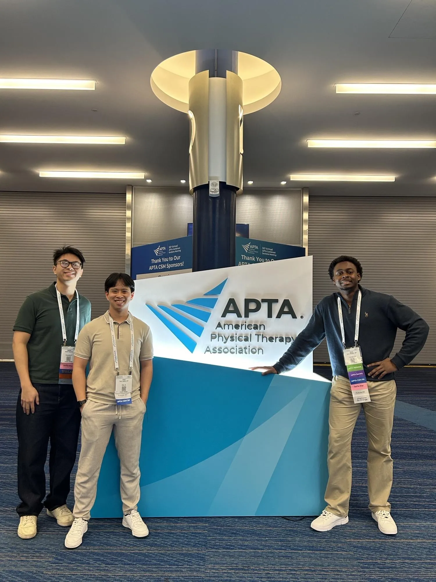 DPT students in front of APTA logo