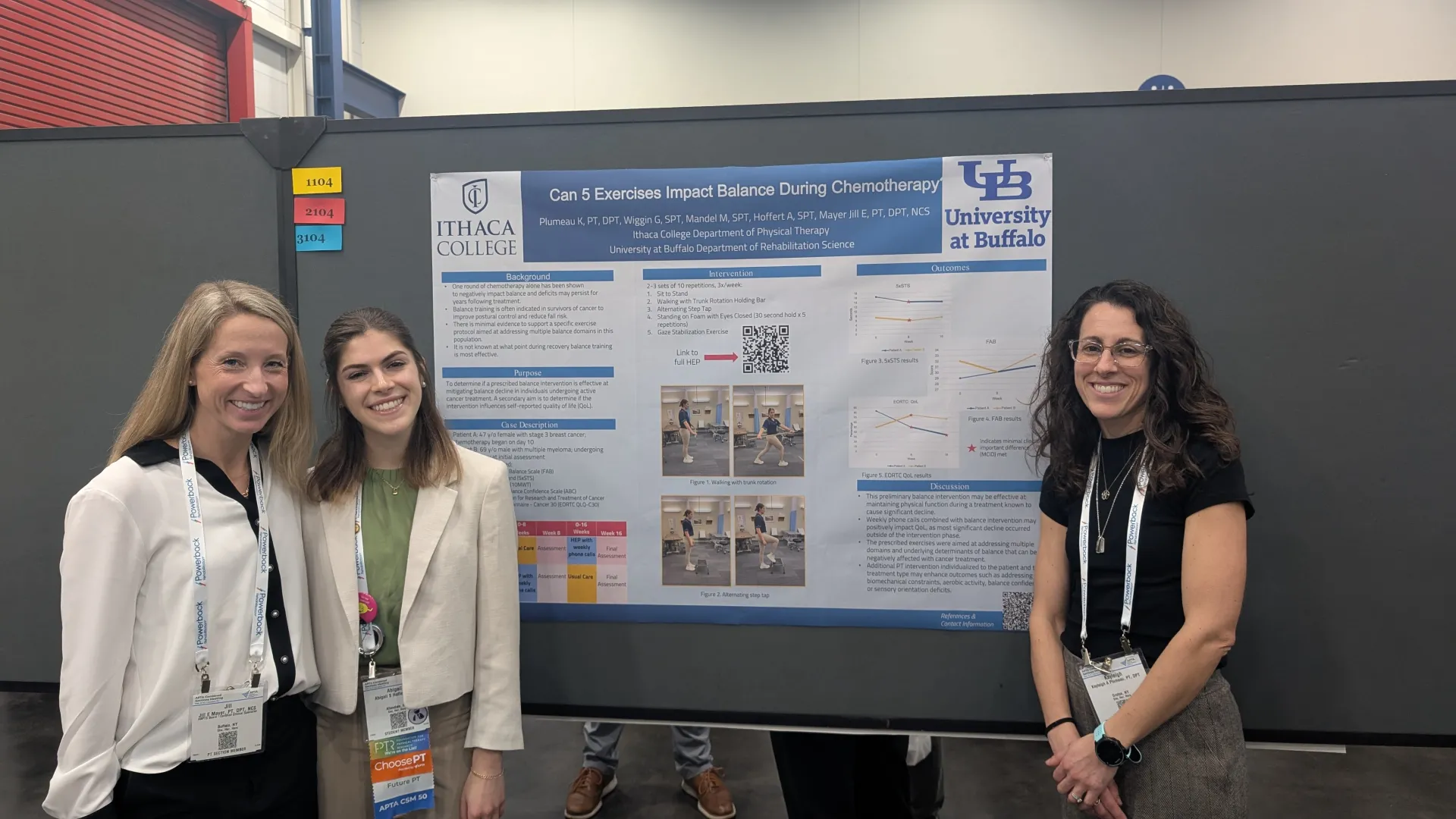 Two PT faculty and a PT student stand in front of a poster