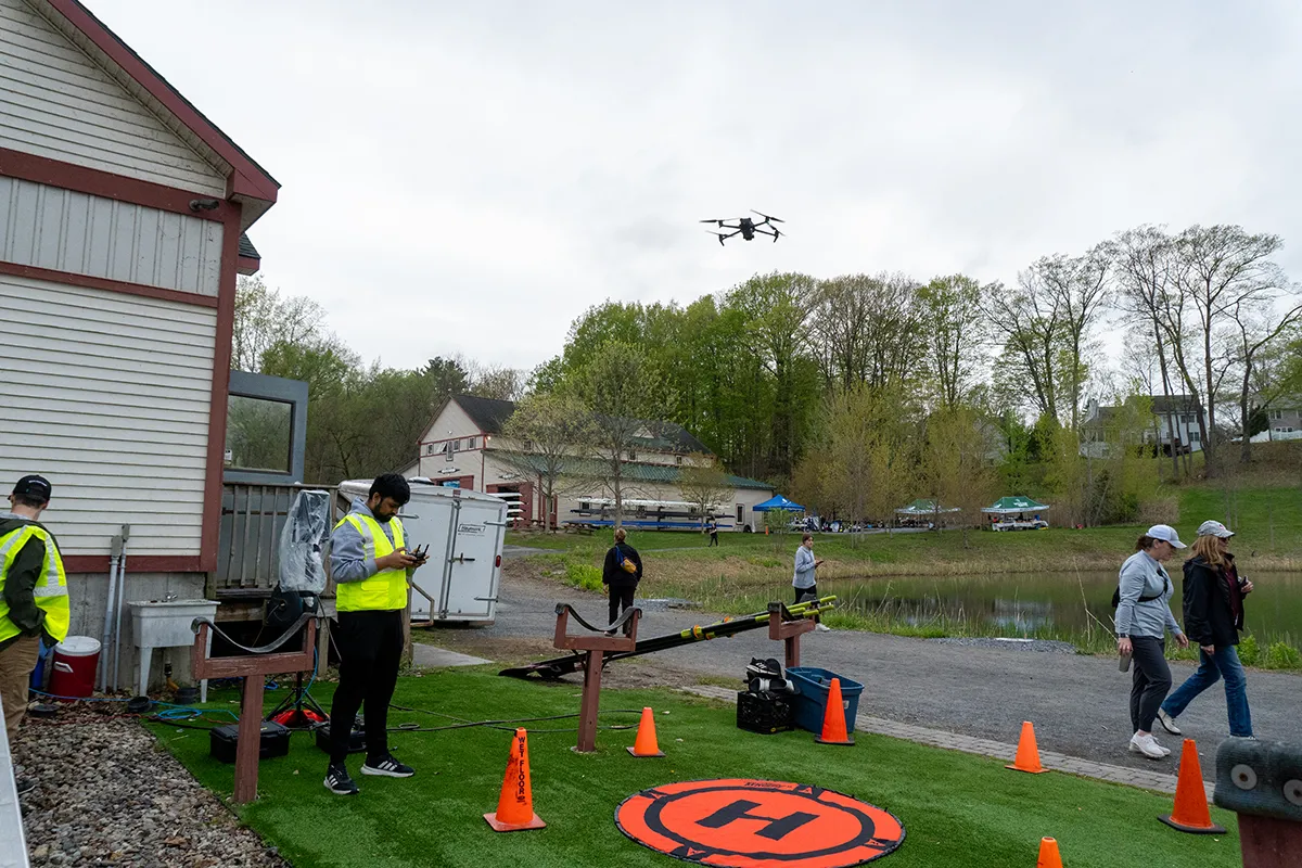 Student flying drone