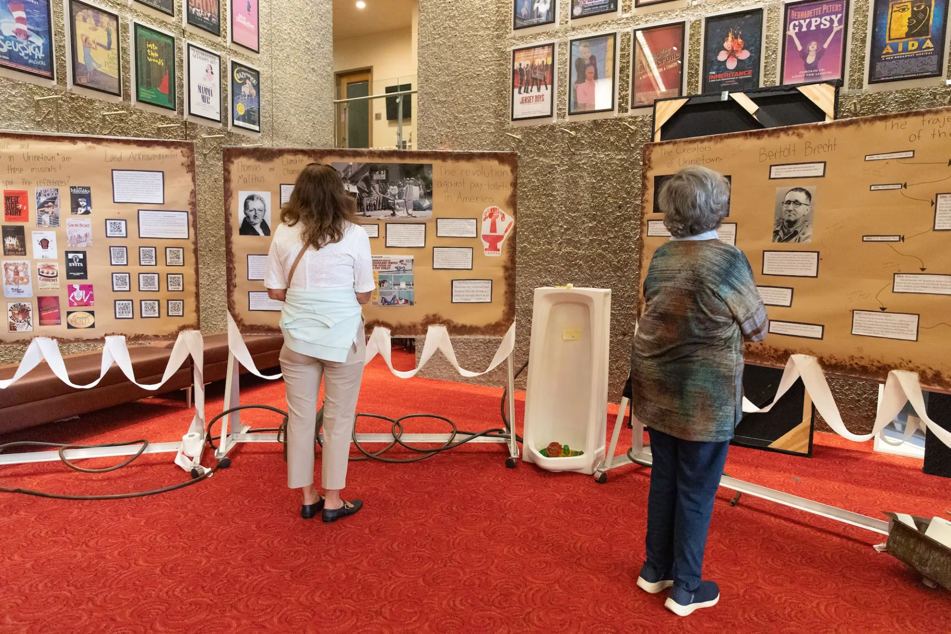visitors at a theatre showcase