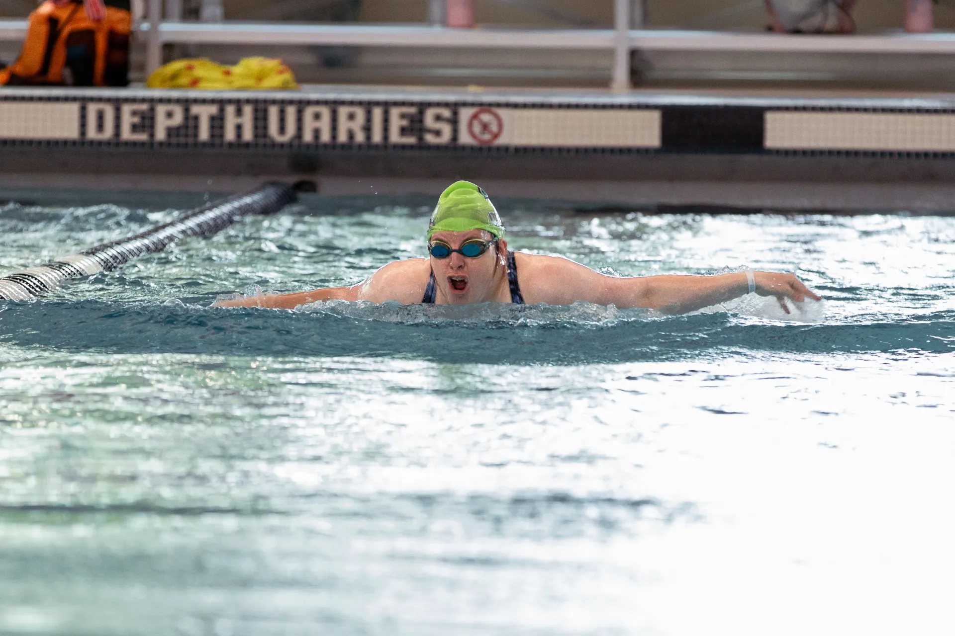 Anne Norby competing in the Special Olympics 50-Meter Fly