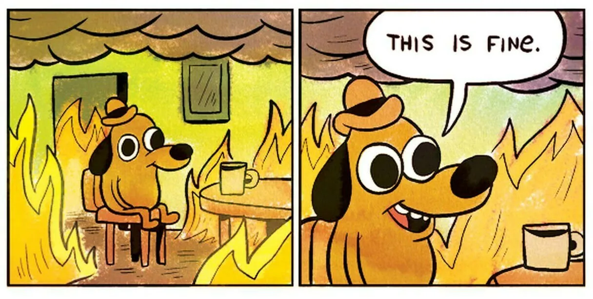 cartoon dog sitting in the midle of a fire saying "this is fine"