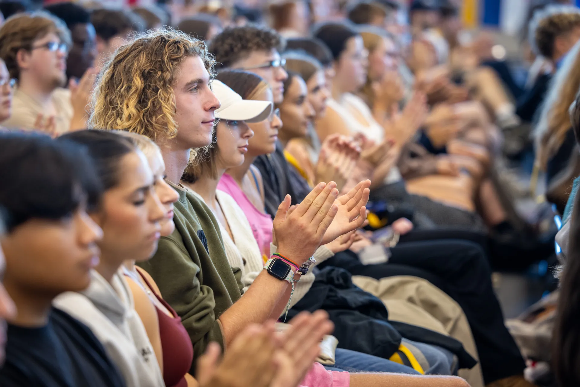 College students listen to a speaker. 
