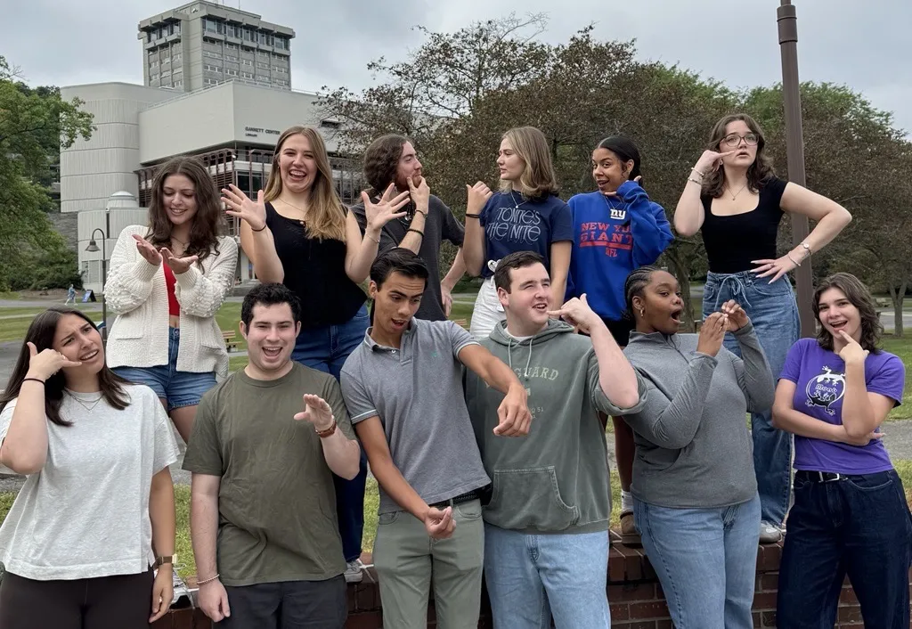 Group of 12 students posing