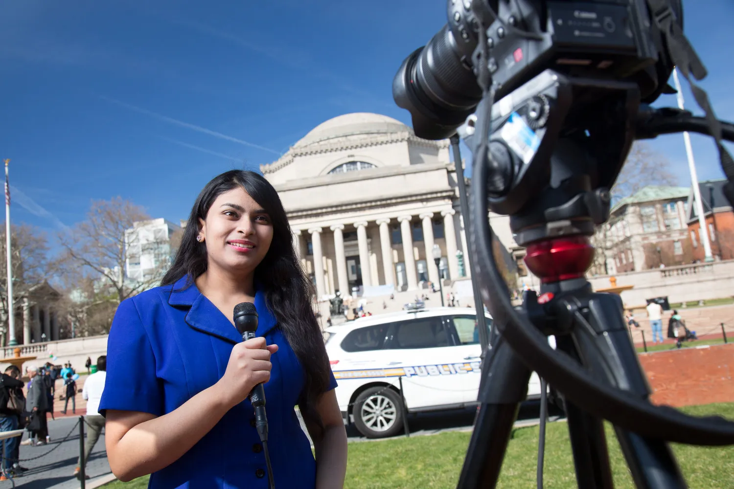 Student journalist presents to the camera