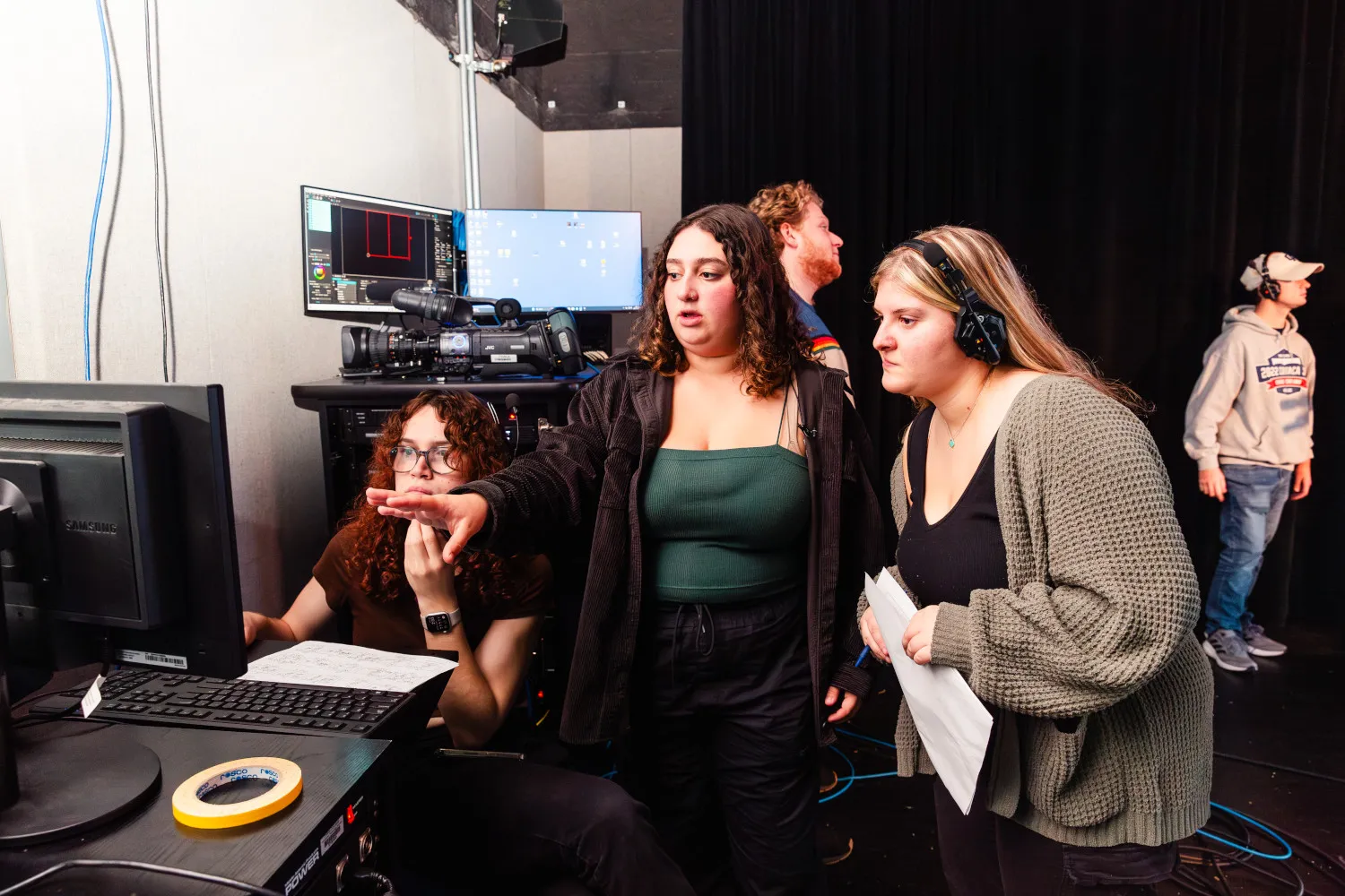 student leading a live creative project