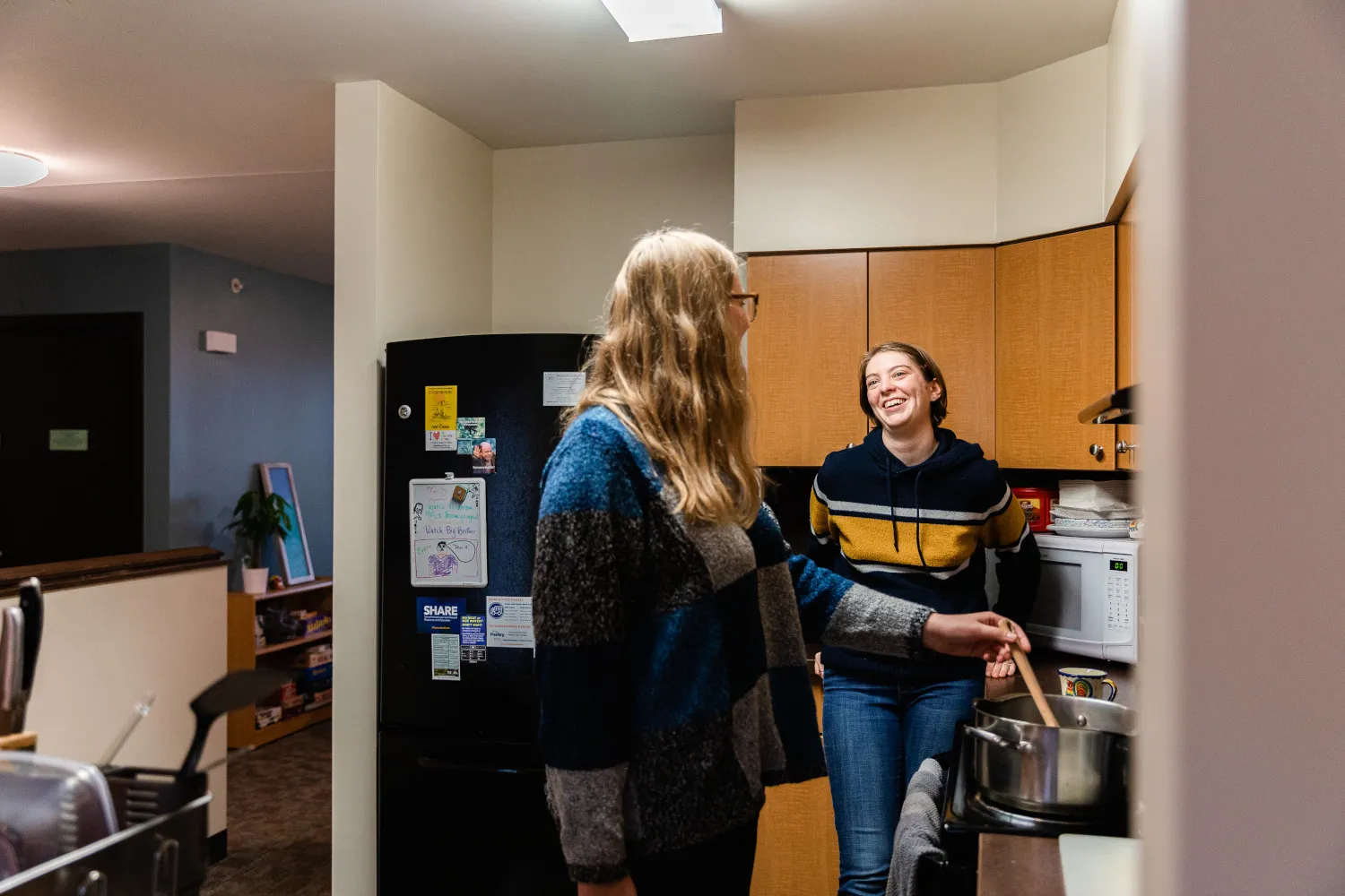 students in their apartment kitchen