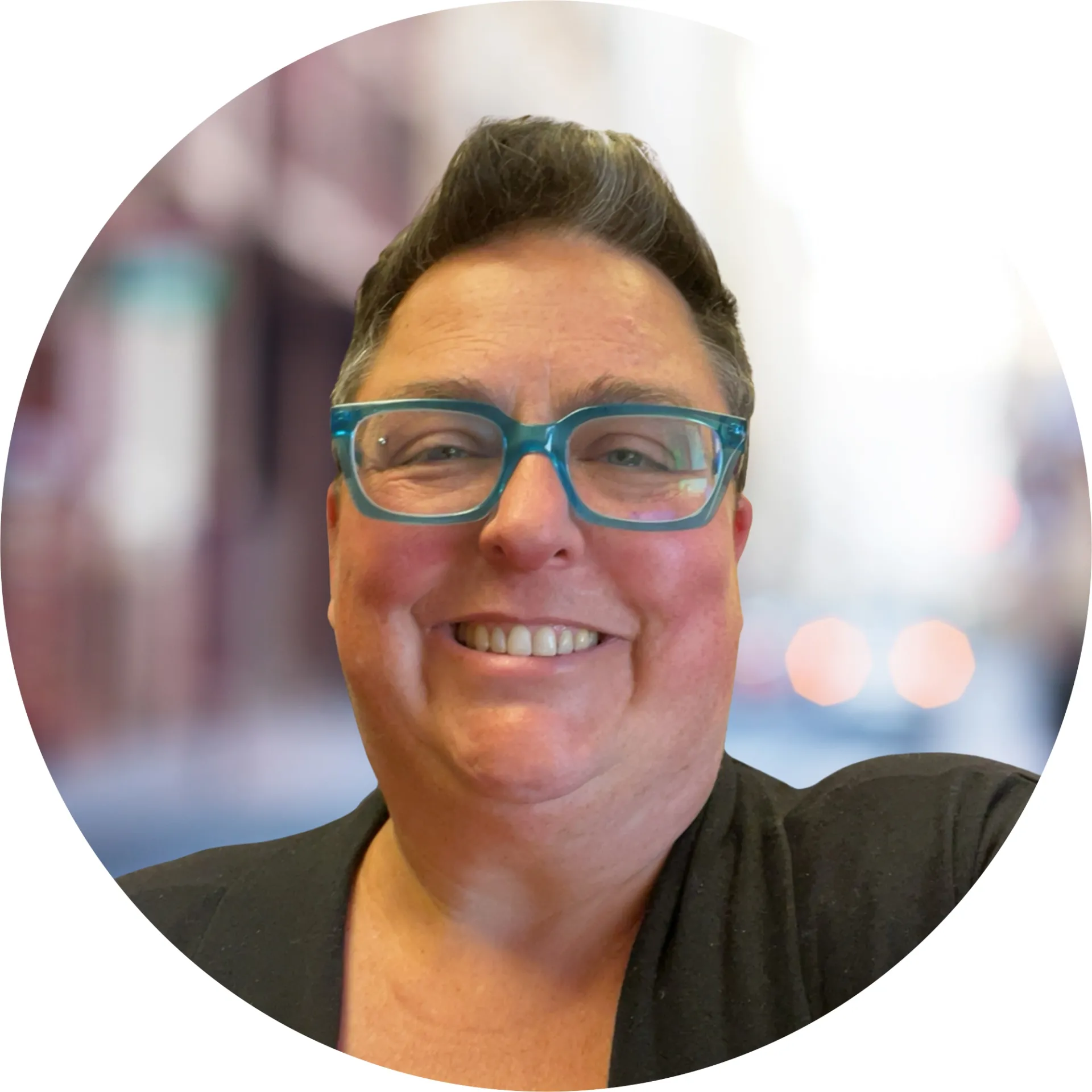 Smiling face with blue glasses