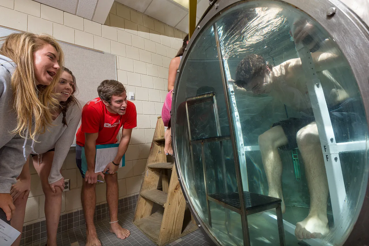 students in underwater exercise tank