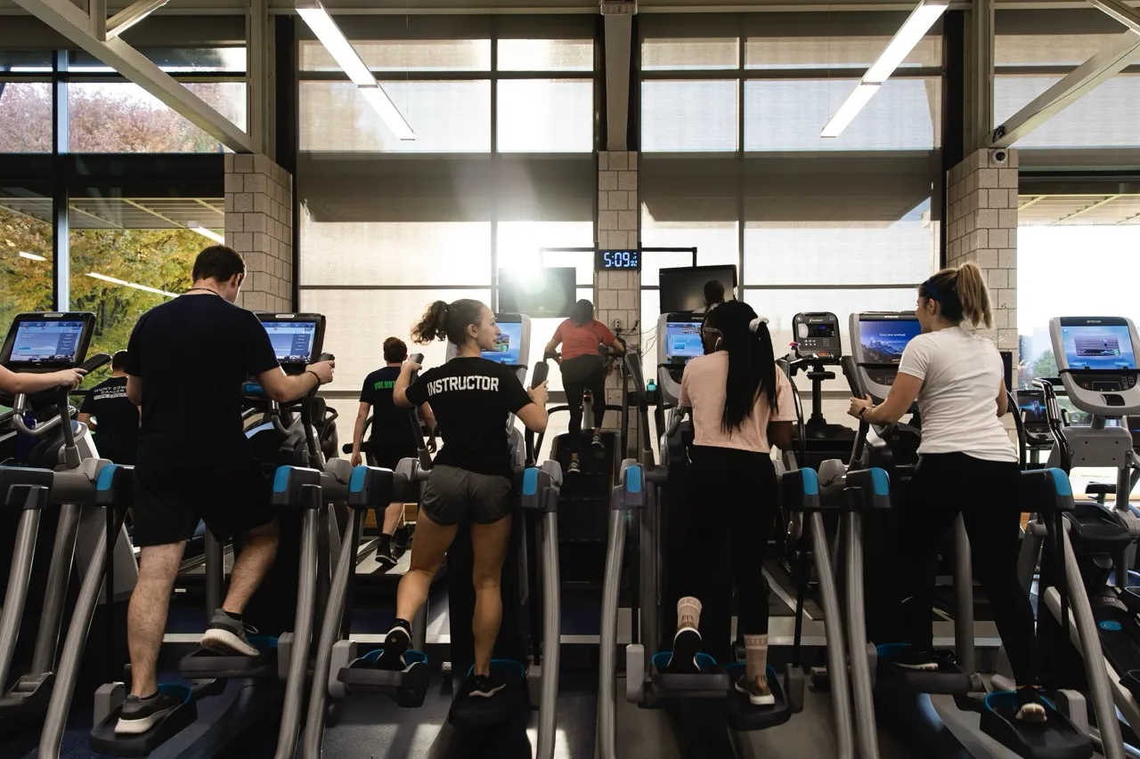 Students in the Ithaca College Wellness Center staying active around their class schedules