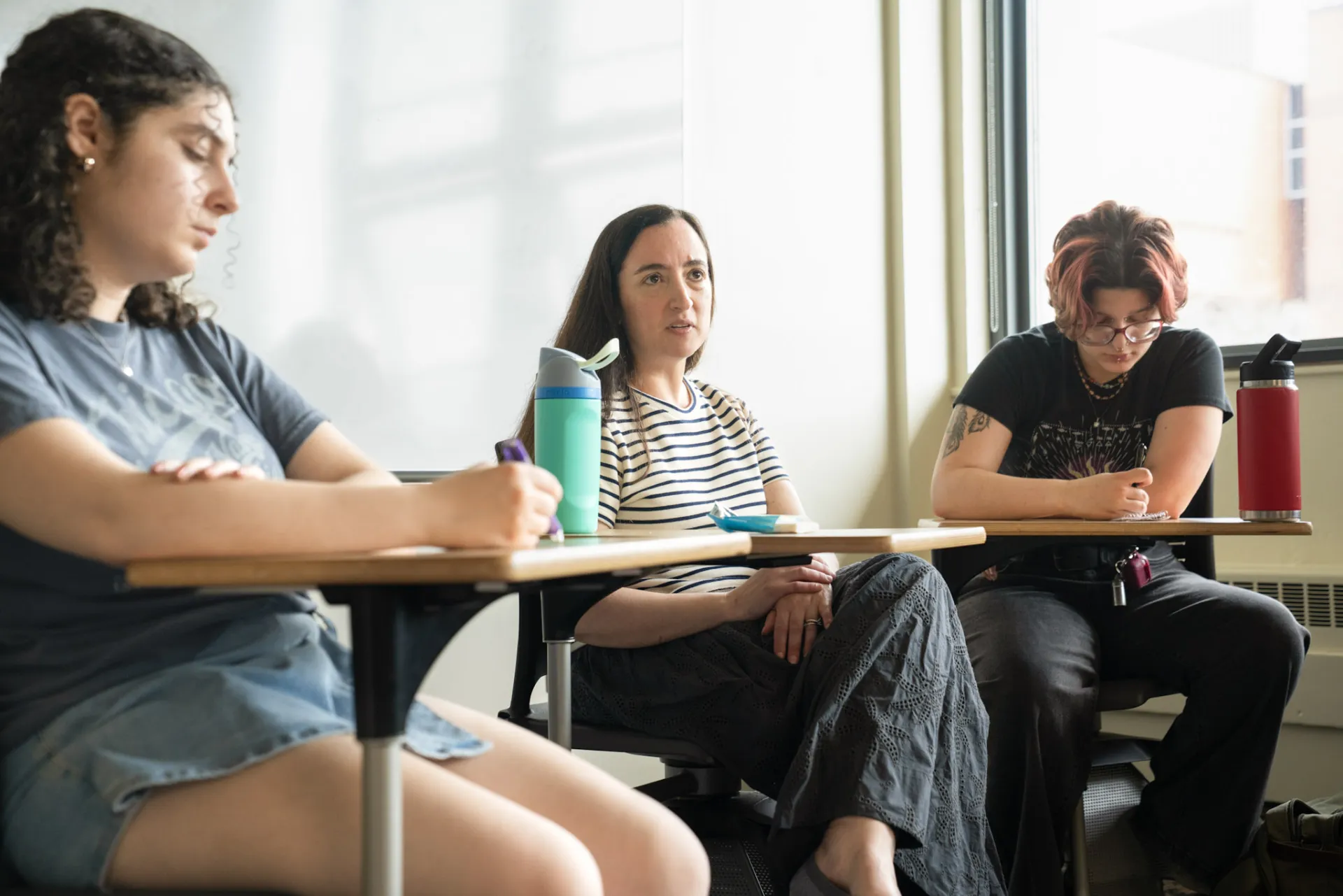 Students and Kate Manne.