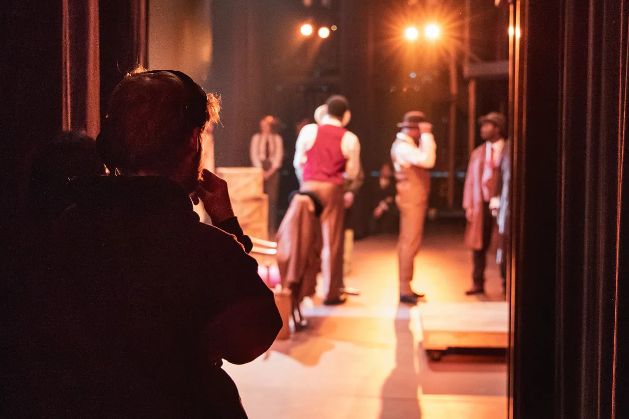 student working backstage of a production