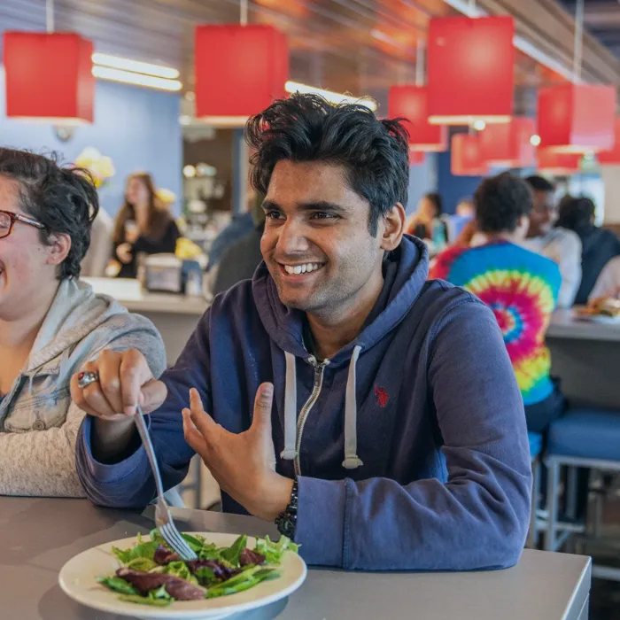 Man smiling while enjoying Terrace Dining options
