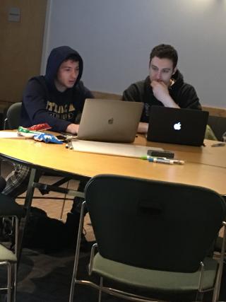 Mark Volkov '21 (left) and Dylan Shane '19 at the codeathon