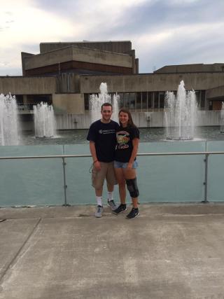 students in front of fountains