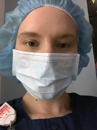 nurse closeup wearing a mask