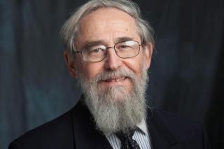 man with glasses and a beard