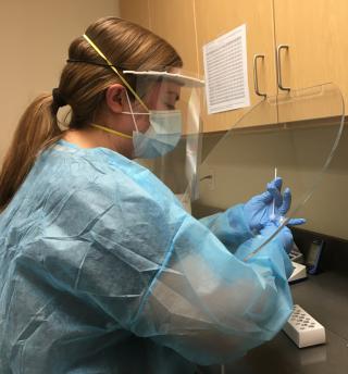 Jessica Gammons running a saliva test