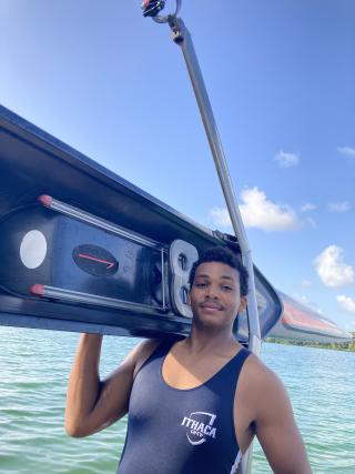 Dehron Smith, carrying his single after his row at home in the Bahamas.