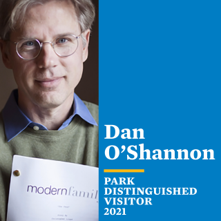 Dan O'Shannon holds a Modern Family script.