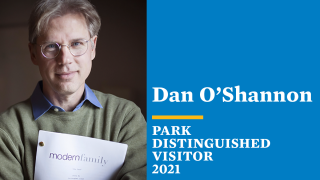 Park Distinguished Visitor Dan O'Shannon holds Modern Family Script.