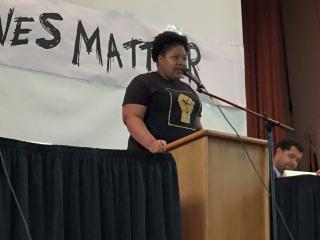 Rita Bunatal speaks at a Black Lives Matter event