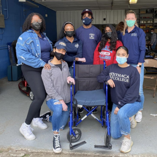 Group photo of students and faculty collaborating with Wonderful Wheelchairs