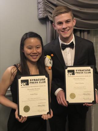 Emily Hung and Grant Johnson accepting award