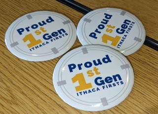 Buttons that say "proud 1st Gen" on them