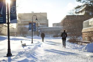 A picture of the main walkway across the Ithaca College campus in winter.