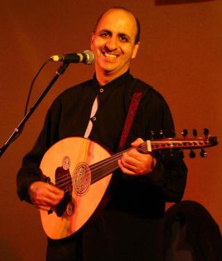 Man playing the oud.