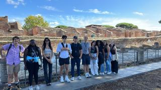 College students on a tour of Ostia Antica in Italy