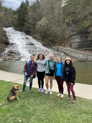 Five hikers and a dog at Buttermilk Falls