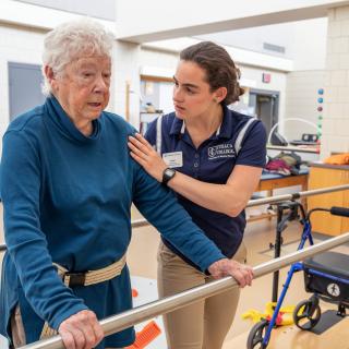 This is a picture of an elderly woman receiving physical therapy services from a student in our clinic. 