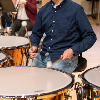 Student playing drum