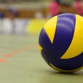 Volleyball on the floor.