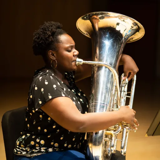 Student playing tuba