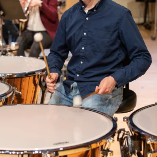 Student playing drum