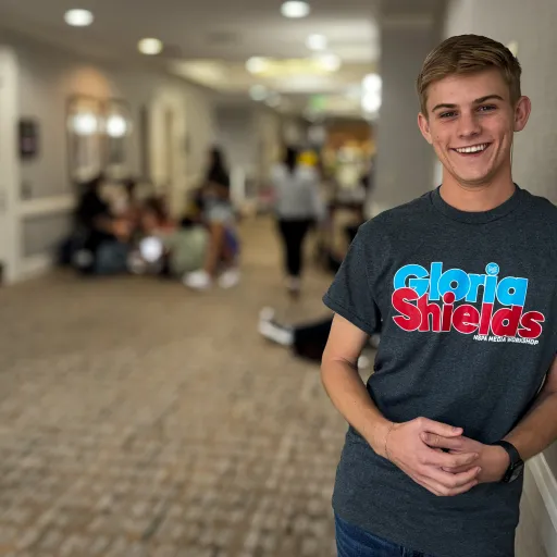 Park Scholar 25' Grant Johnson volunteering with the Gloria Shields NSP Media Workshop