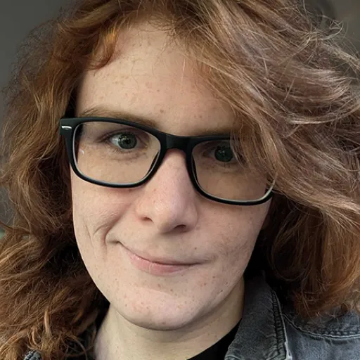 Close up of a person's face with long hair