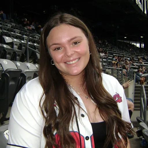 A woman at a baseball game