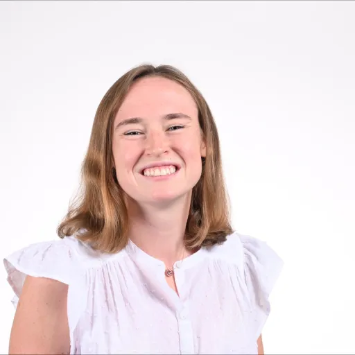 Emma Heinze smiling with a big grin