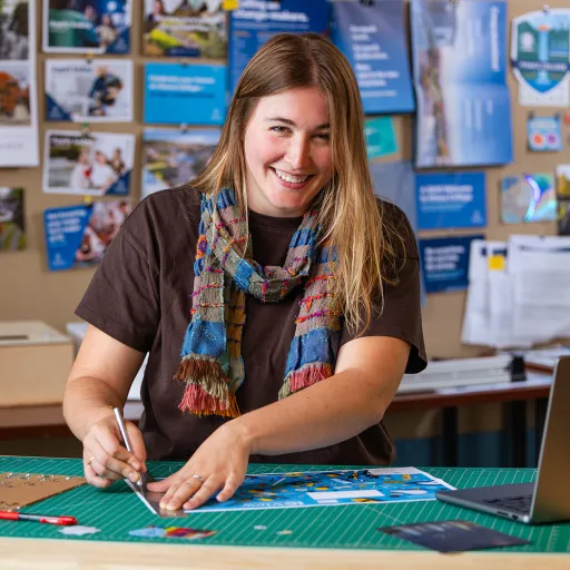 Headshot of Areya Muraca in the Ithaca College Marketing Communications collaborative design space