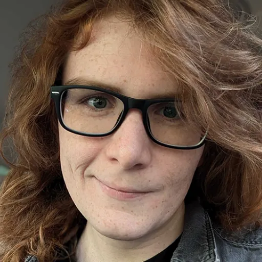 Close up of a person's face with long hair